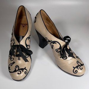 Fluevog "Sight" pumps, tan and black, size 9